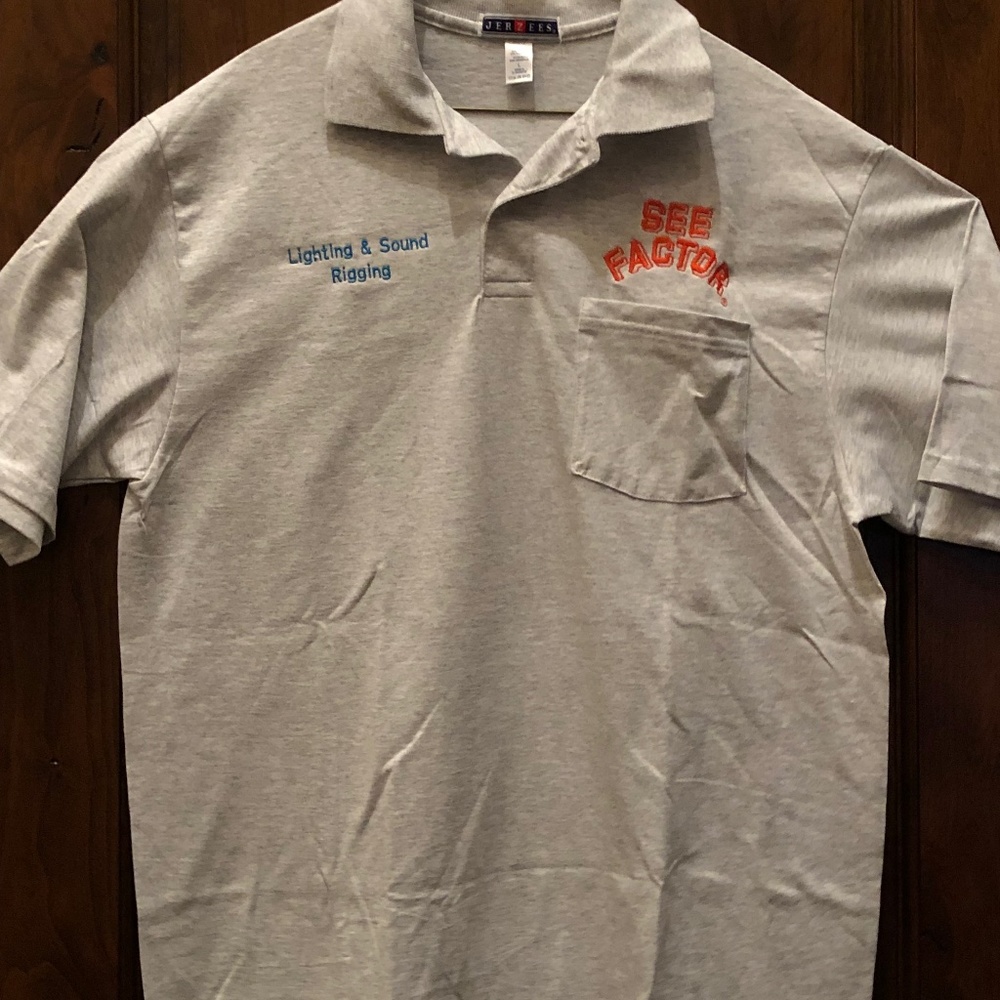 See Factor NY Entertainment Company Golf shirt